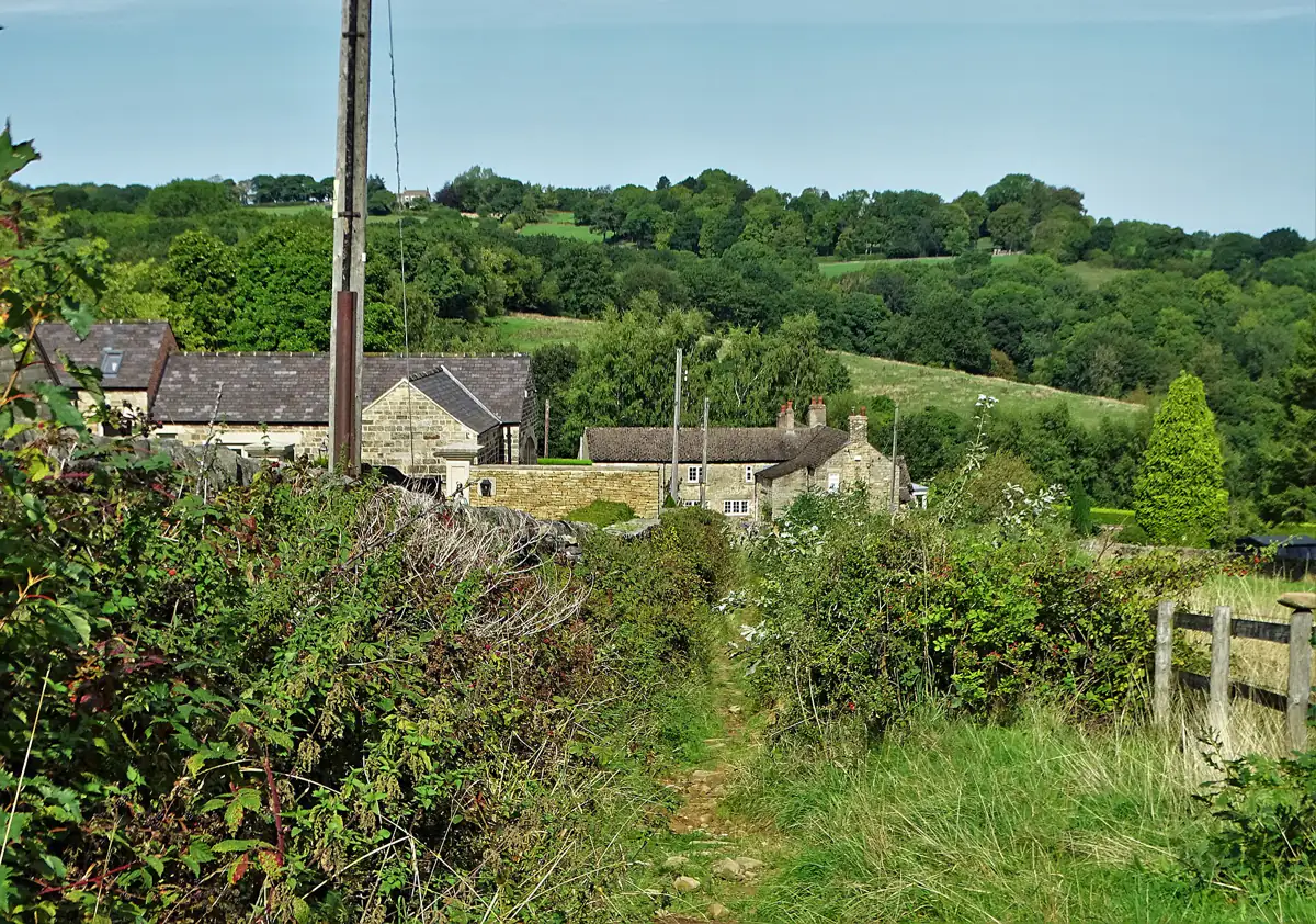 Stone houses among green hills at Holymoorside, near Chesterfield