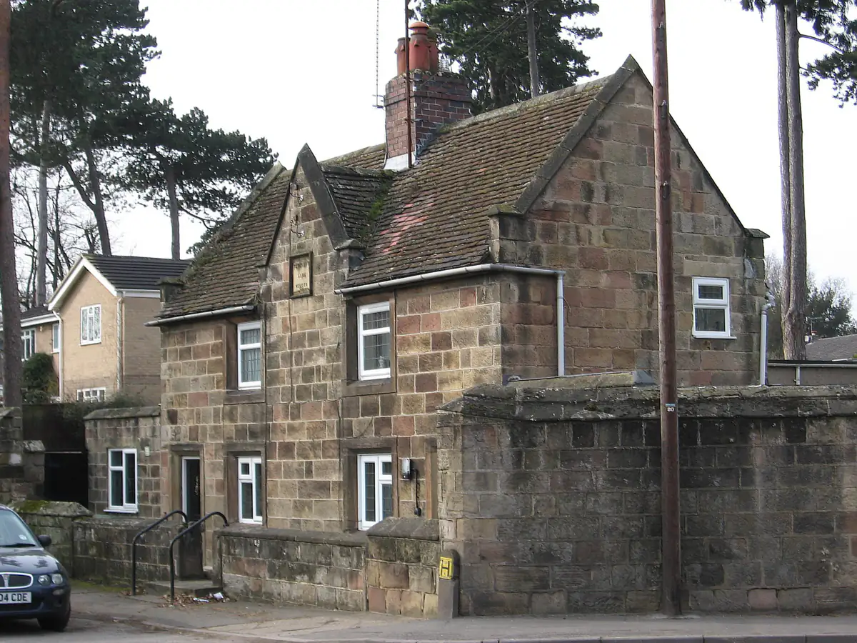 Semi-detached houses and autumn trees on Hillsway in Littleover