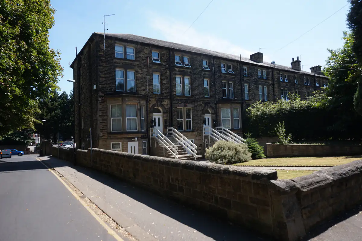 A large red-brick Victorian house on Bentcliffe Lane in Roundhay, Leeds