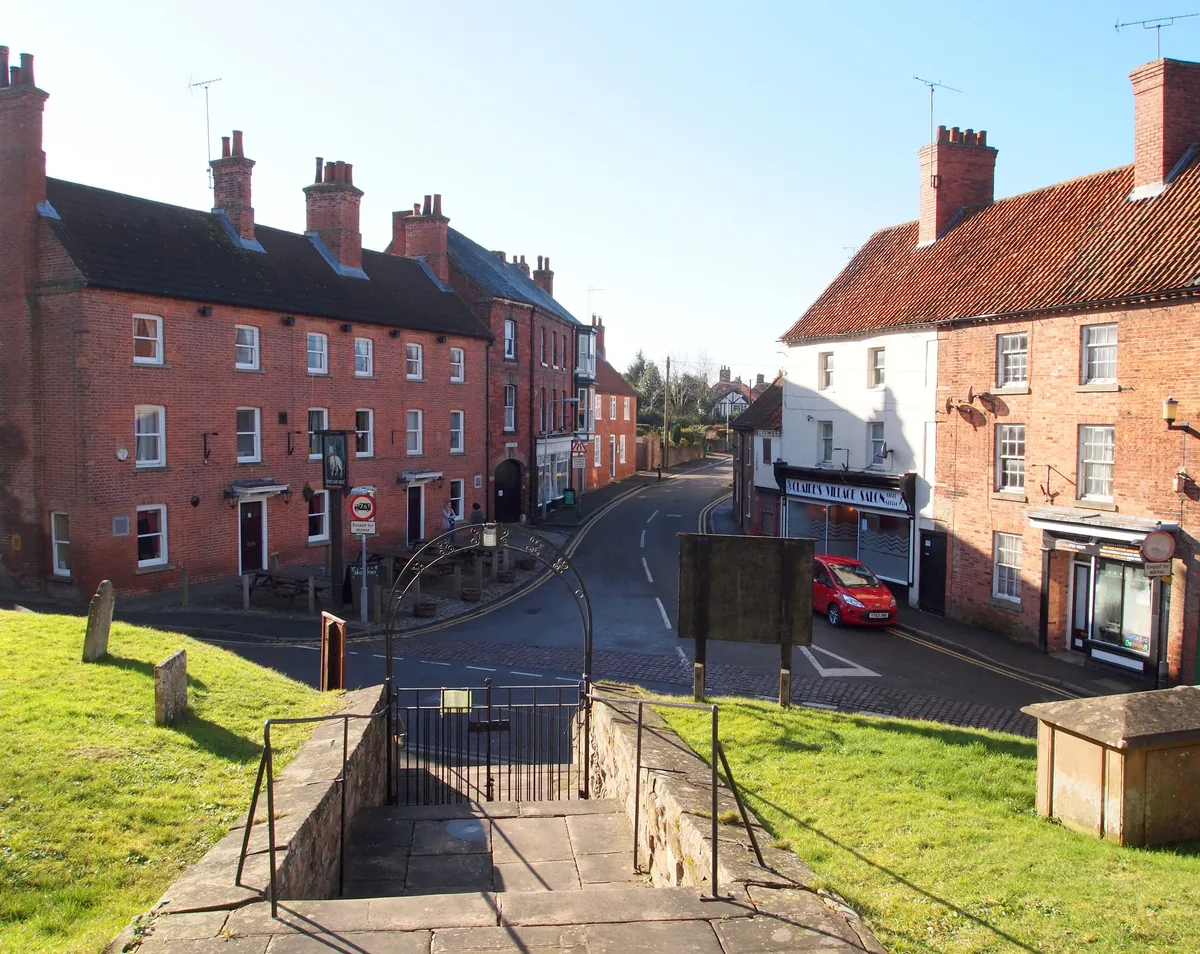 Georgian red-brick houses along the main street in Ollerton village